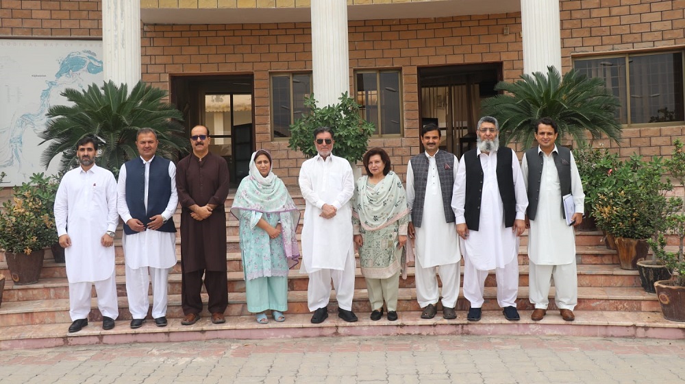 The Vice Chancellor Prof. Dr. Muhammad Naeem Qazi after presiding a  'BoG' meeting at National Centre of Excellence in Geology along with  members posing for a group photograph at the facade.